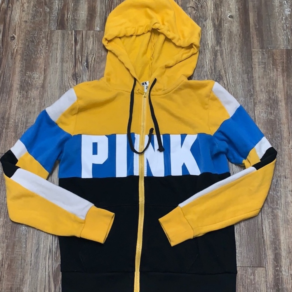 A yellow, blue, and black, Victoria secret jacket!